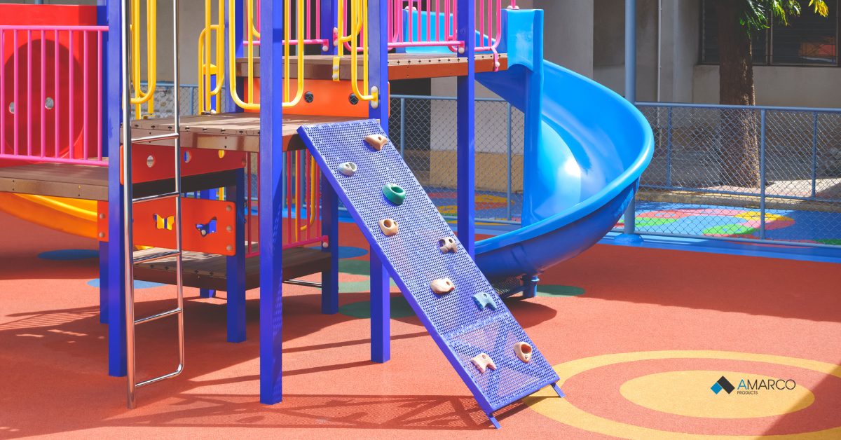 A vibrant school playground structure set on safe, impact-absorbing outdoor rubber flooring for schools.