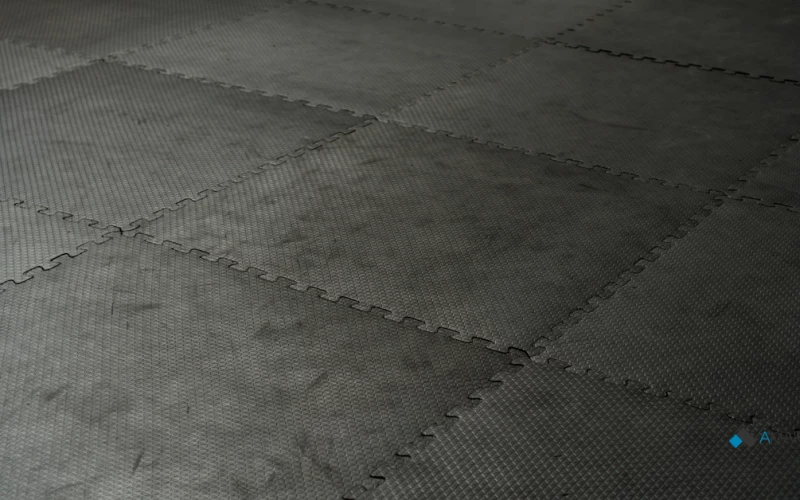 Re-Vulcanized vs. Urethane-Bonded Rubber: A Specifier’s Guide to Commercial Flooring